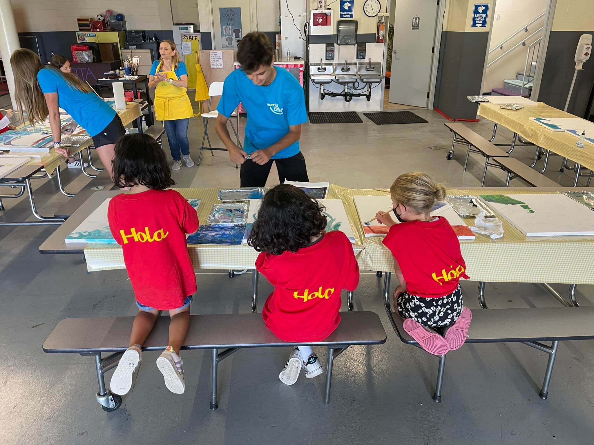 Kids painting at camp